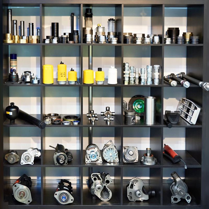 Mercedes-Benz spare parts neatly displayed on shelf – engine components, filters, bearings, and more available from M&B Parts South Africa